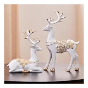 Amazon Basics Creative Resin Golden and White Reindeer Sculptures