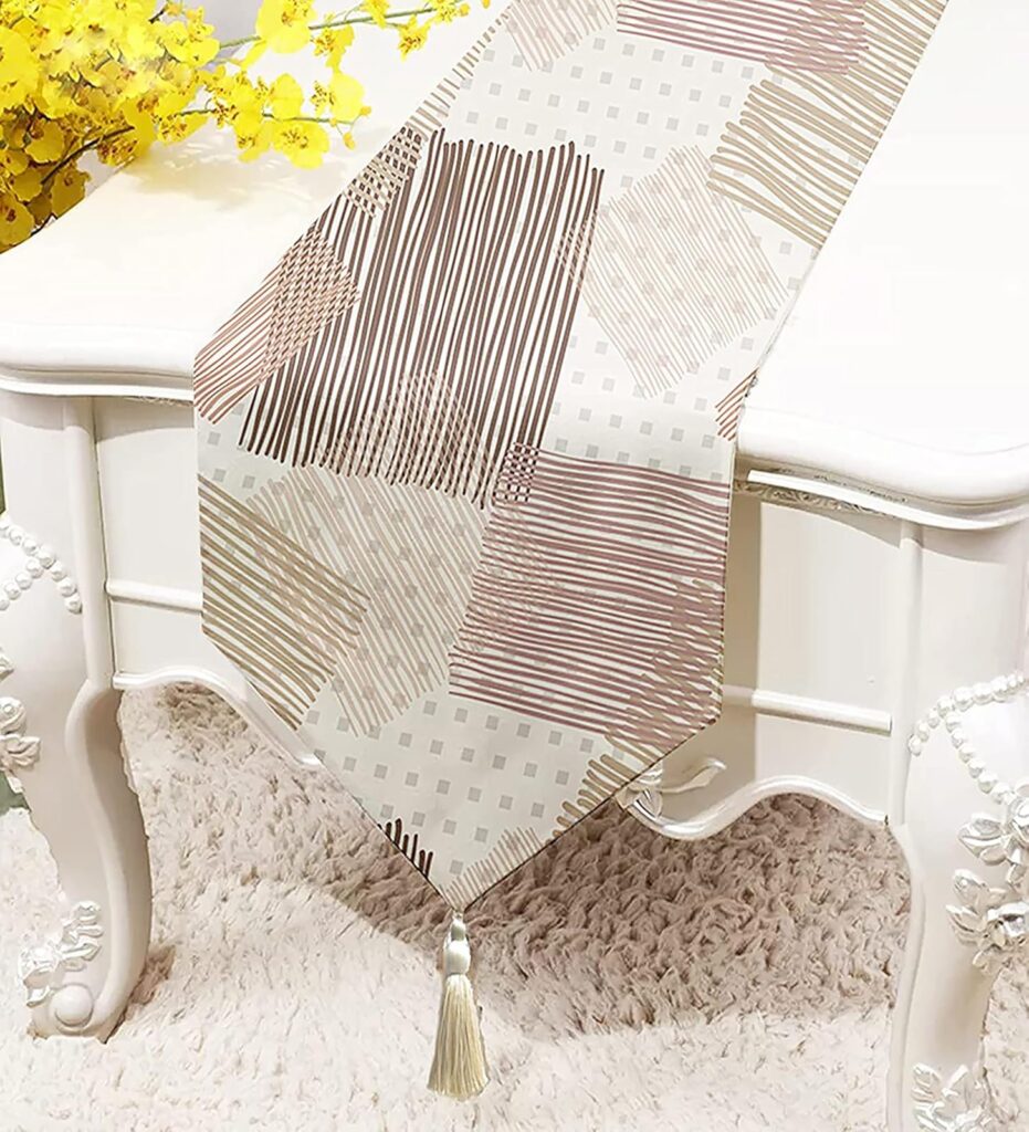 STITCHNEST Table Runner with Tassel 13×60 Inches for Rs. 149